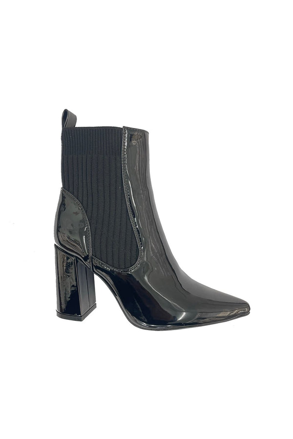 Stretch Pull-Up Block Heel Ankle Boots with a pointed toe and stud detailing, offering a stylish and comfortable fit for various outfits.