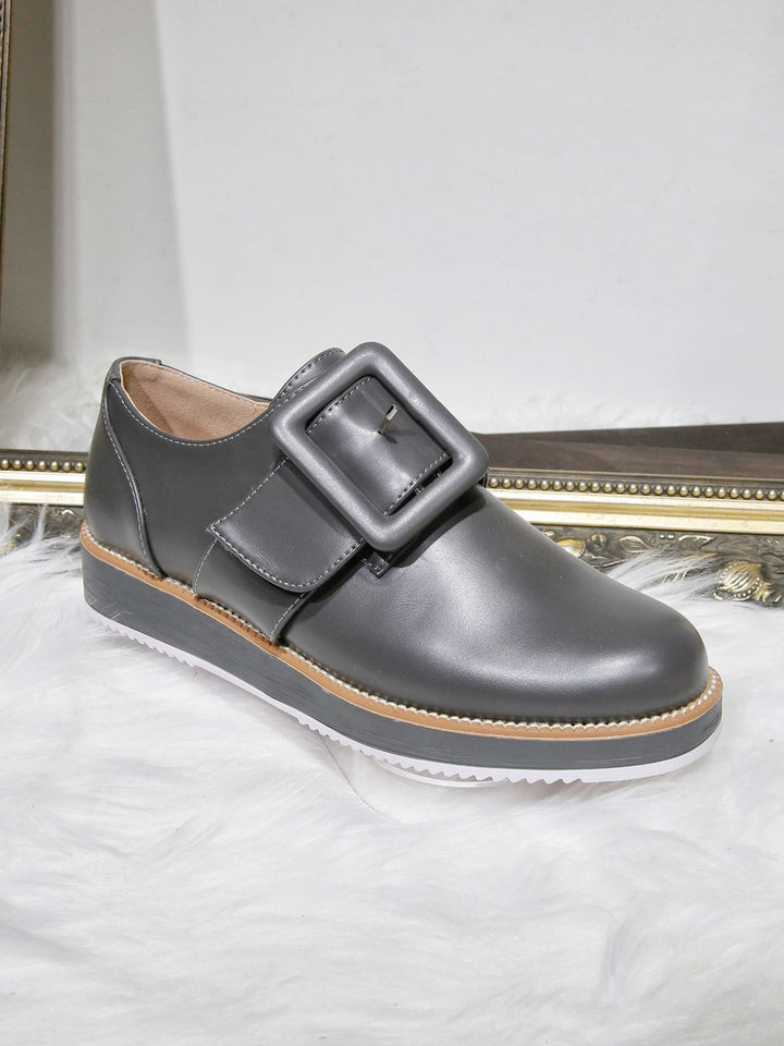 Ella Fashion Flat Shoes with a chic grey design featuring a buckle, crafted in faux leather, perfect for stylish, everyday comfort.