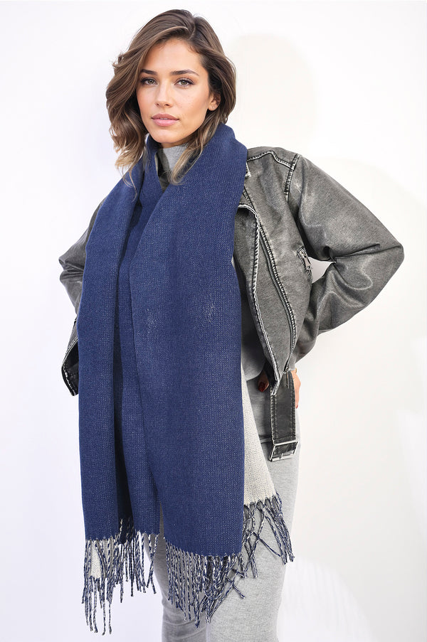 Woman wearing Winter Oversized Scarf with Tassel, showcasing its generous size and chic design perfect for stylish warmth during the winter season.