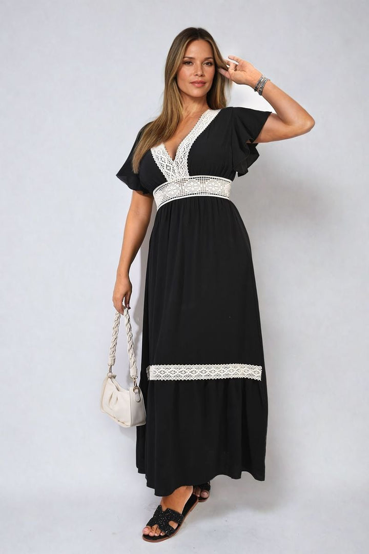 V-neck Lace Trim Maxi Dress features a deep V-neck and white lace trim, paired with a white braided strap purse, ideal for elegant events.