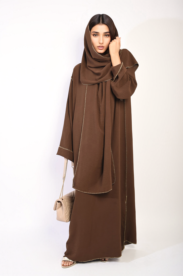 Long Sleeve Closed Abaya Maxi Dress with Embellished Piping worn by a woman, showcasing elegant design and modesty for versatile occasions.