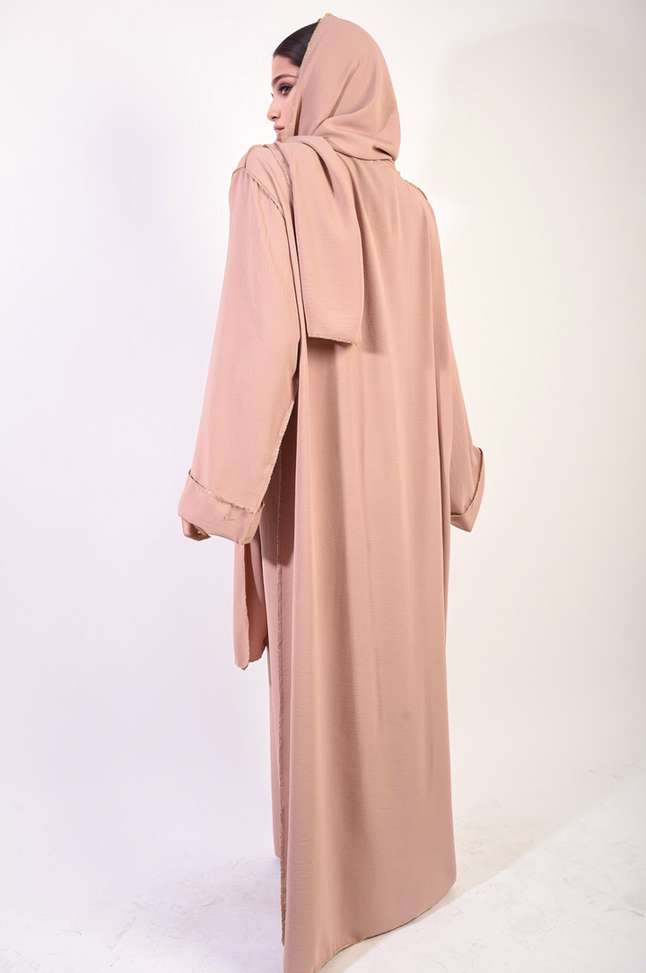 Long Sleeve Closed Abaya Maxi Dress with Embellished Piping displayed on a mannequin, featuring a coordinating scarf, highlighting modest and elegant fashion.