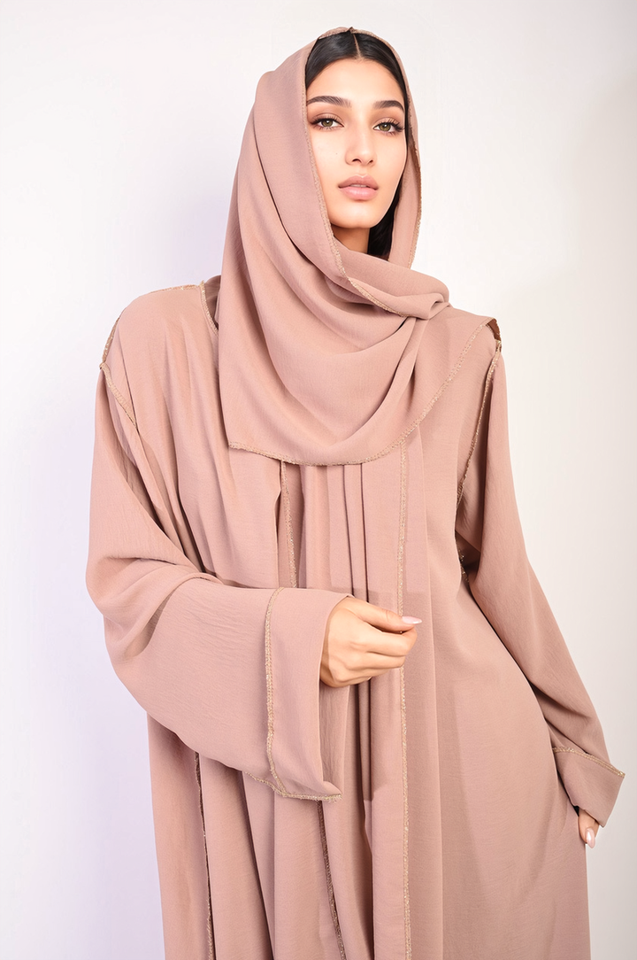 Woman wearing Long Sleeve Closed Abaya Maxi Dress with Embellished Piping, showcasing modest elegance and style. Includes matching scarf. Perfect for versatile occasions.