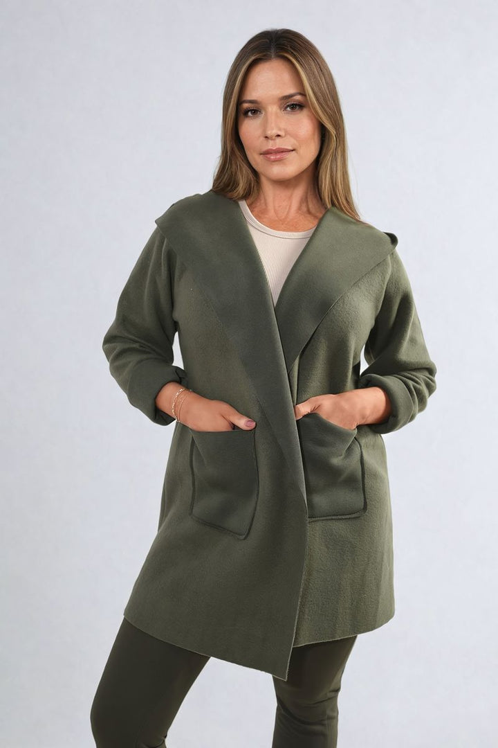 Woman wearing the Open Front Folded Sleeve Jacket with Pockets, showcasing its open front and folded sleeves, ideal for stylish layering and casual outings.