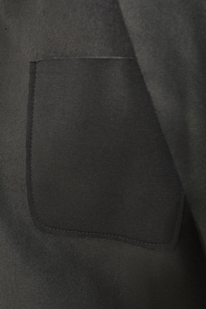 Close-up of the Alma Open Front Folded Sleeve Jacket with Pockets, highlighting its sleek design and practical pocket feature, ideal for casual, stylish outings.