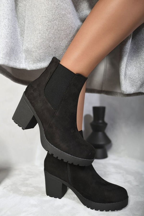 Block Chunky Heel Ankle Boots with stylish block heel, perfect for adding height and comfort, showcased on a person's legs, ideal for chic and trendy looks.