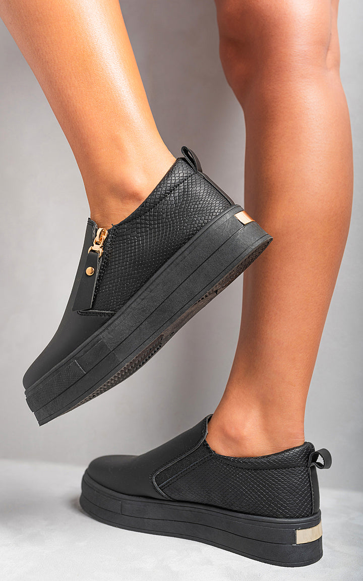 Andrea Zipper Decor Slip On Trainers with sleek silhouette and zipper accent, highlighting modern urban style and slip-on convenience. Perfect for versatile, stylish wear.