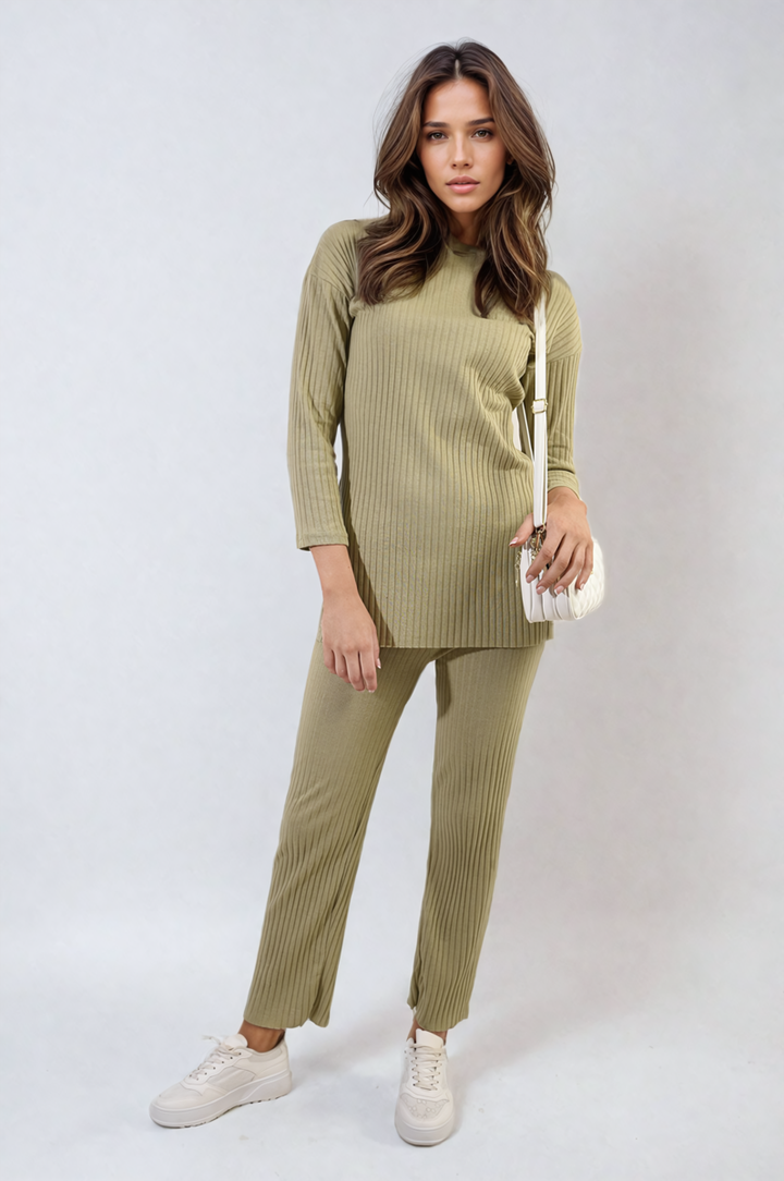 Woman in Annalise Knitted Top and Trouser Co-ord Set, showcasing relaxed fit and stylish comfort, ideal for casual outings or lounging.