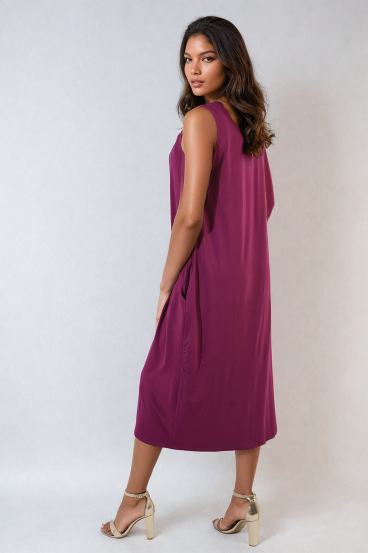 Sleeveless Slit Midi Dress with Side Pockets features a sleek design, sleeveless cut, and practical side pockets, ideal for stylish comfort.