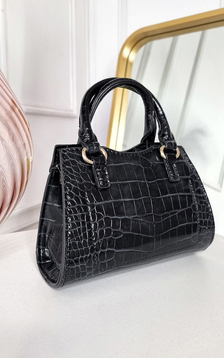 Croc Print Handbag featuring a chic black faux leather design with gold accents, perfect for stylish and organized outings.