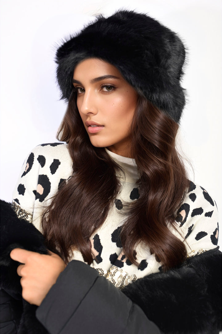 Woman wearing a stylish Fluffy Faux Fur Winter Hat, showcasing its cozy, sophisticated design, perfect for enhancing any winter outfit.