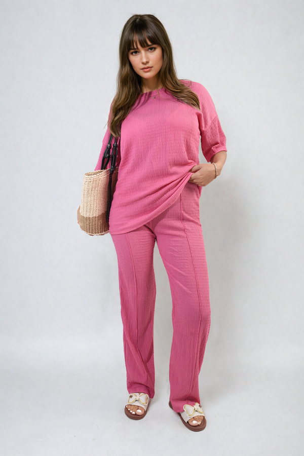 Woman showcasing Cheesecloth Pattern Top and Trouser Co-ord Set, featuring a relaxed fit perfect for casual or lounging occasions.