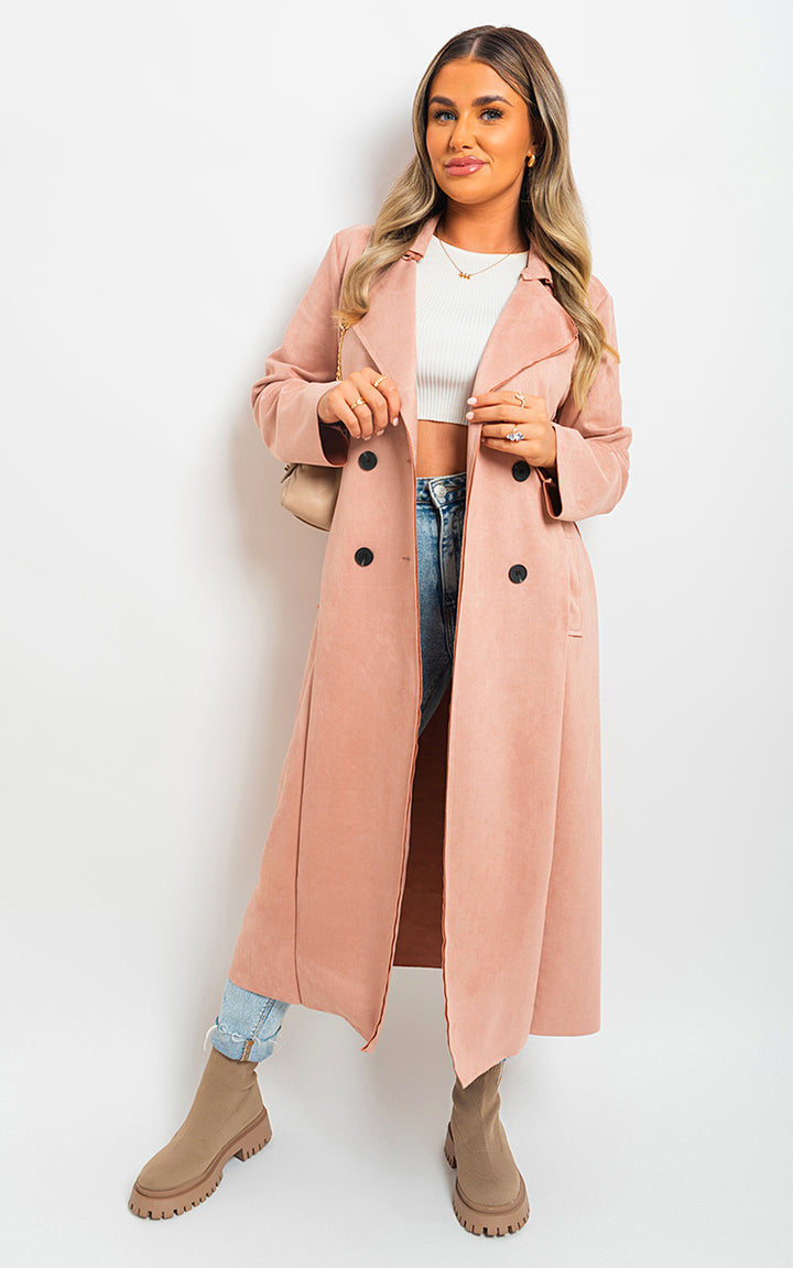 Woman wearing an Open Front Lapel Neck Longline Trench Coat, showcasing its stylish design and sophisticated lapel neck, ideal for versatile fashion in transitional seasons.