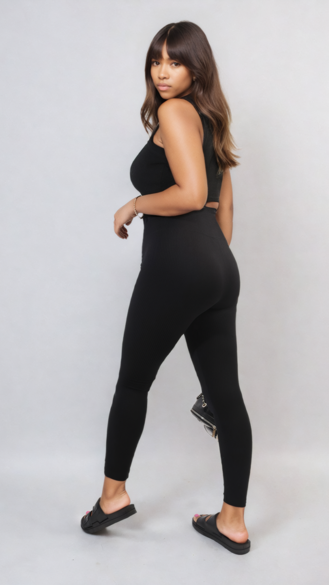 Woman wearing Braylee High Waisted Wide Band Leggings, showcasing sleek design and high-waisted fit, ideal for workouts or casual wear.