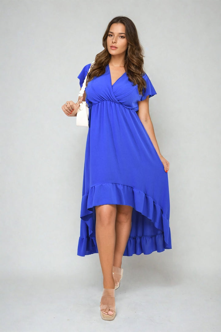 High Low Ruffle Hem Maxi Dress worn by a woman, showcasing its elegant design with a flowing silhouette and playful ruffle hem.