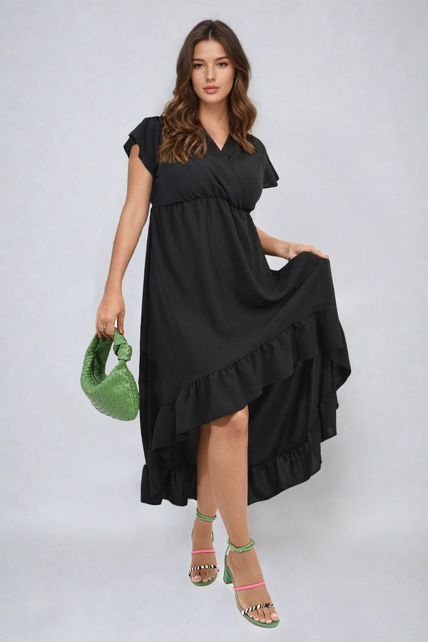 Woman in a black High Low Ruffle Hem Maxi Dress, holding a green woven bag, showcasing elegant ruffle detail for versatile styling.