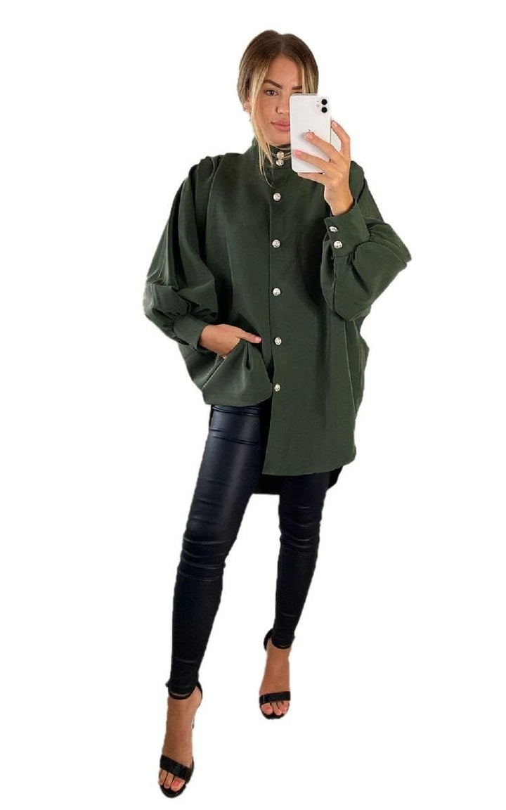 Oversized High Neck Shirt modeled by a woman taking a selfie, showcasing its relaxed fit and stylish design, perfect for casual or sophisticated looks.