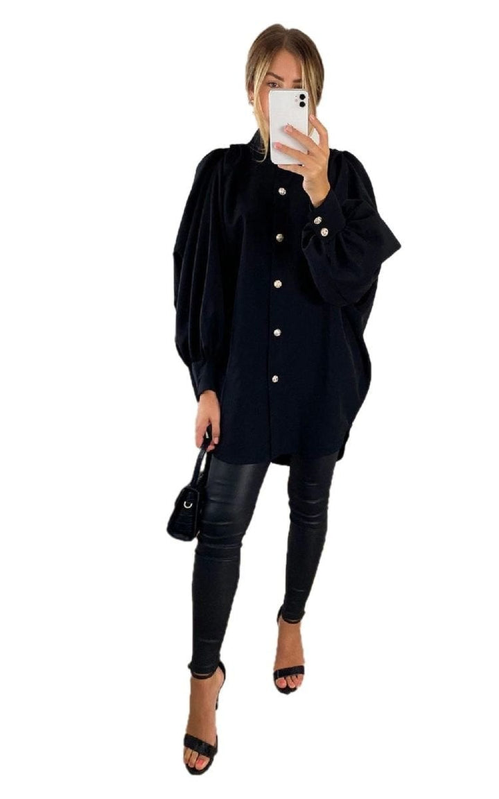 Woman taking a selfie in an oversized high-neck shirt, highlighting its relaxed fit and stylish design, perfect for casual or sophisticated looks.