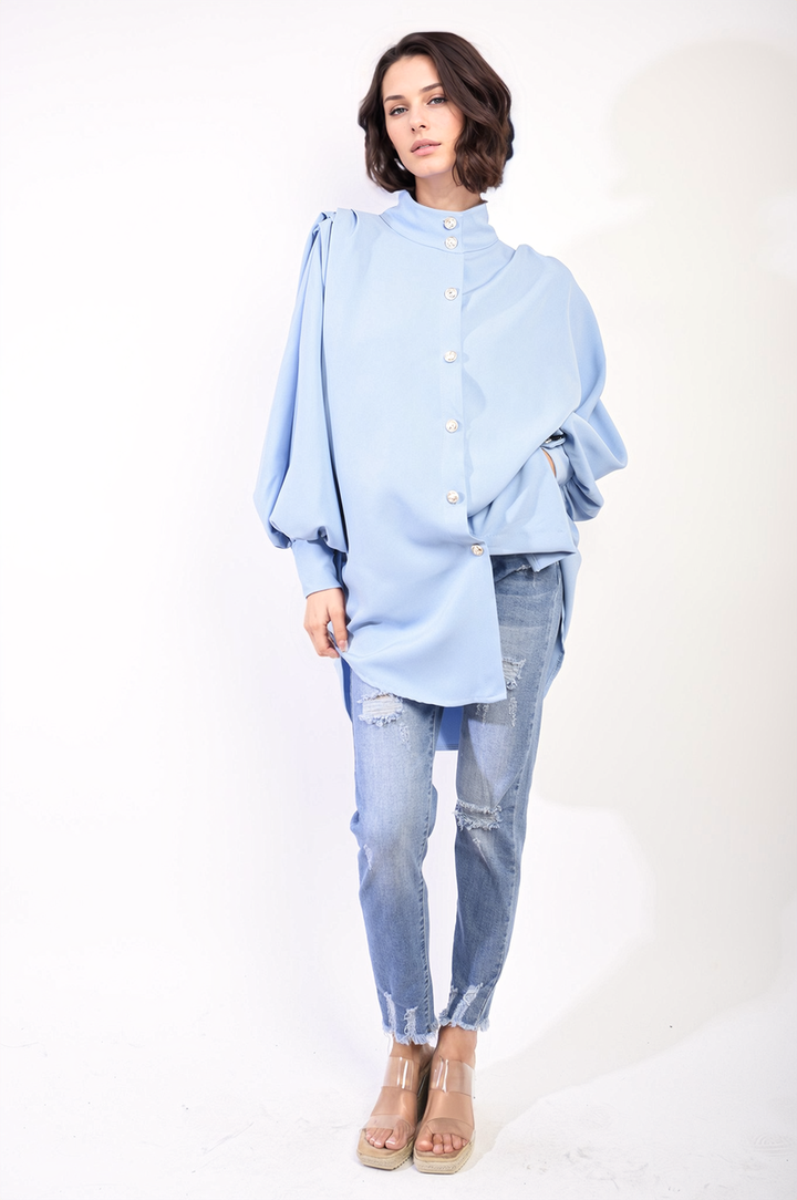 Oversized High Neck Shirt styled with ripped jeans and sandals, highlighting its relaxed fit and casual elegance, perfect for versatile everyday wear.