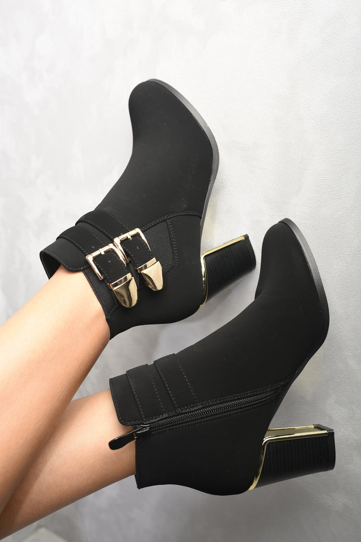 Clara Buckle Straps Block High Heels Ankle Boots with gold buckles, offering chic style and easy wear for versatile holiday or everyday fashion.