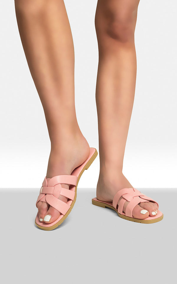 Person wearing Dana Faux Leather Flat Casual Sandals, showcasing their flexibility and comfort. Ideal for stylish, everyday use, reflecting the essence of Holiday-clothes.co.uk's versatile offerings.