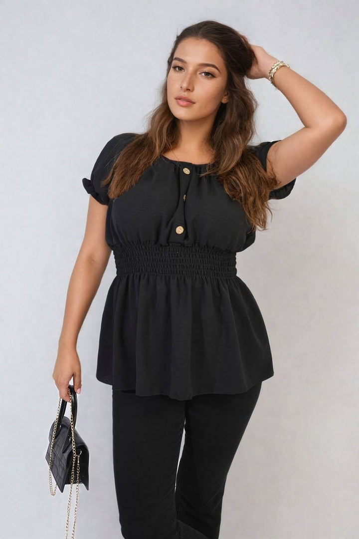 Woman modeling the Daniela Button Front Cinched Waist Top, showcasing its flattering fit and elegant design, perfect for stylish, everyday wear.