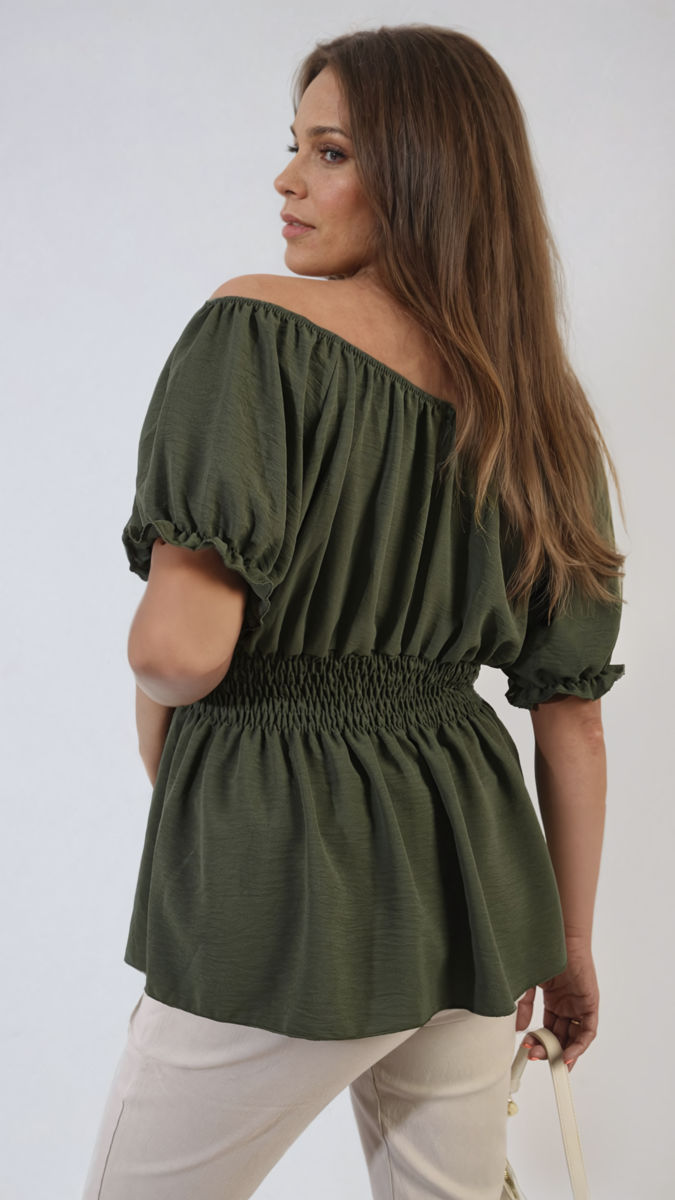 Woman wearing Daniela Button Front Cinched Waist Top, showcasing its chic design with a cinched waist and button detail, ideal for stylish comfort.