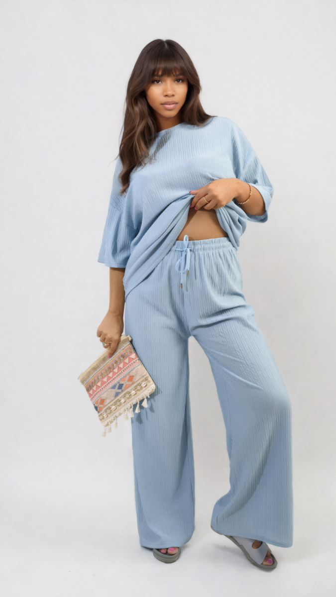 Woman wearing Ribbed Oversized Top and Drawstring Wide Leg Trouser Co-ord Set, showcasing a stylish and comfortable look with an easy-to-wear design.