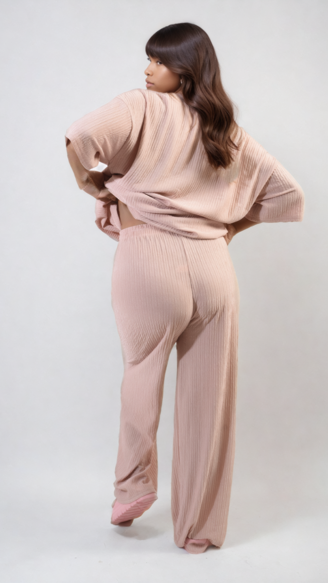 Ribbed Oversized Top and Drawstring Wide Leg Trouser Co-ord Set, featuring a cozy fit, modeled by a woman in a stylish, laid-back pose.