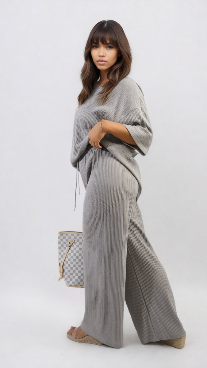 Ribbed Oversized Top and Drawstring Wide Leg Trouser Co-ord Set modeled by a woman, showcasing the comfortable and stylish fit.