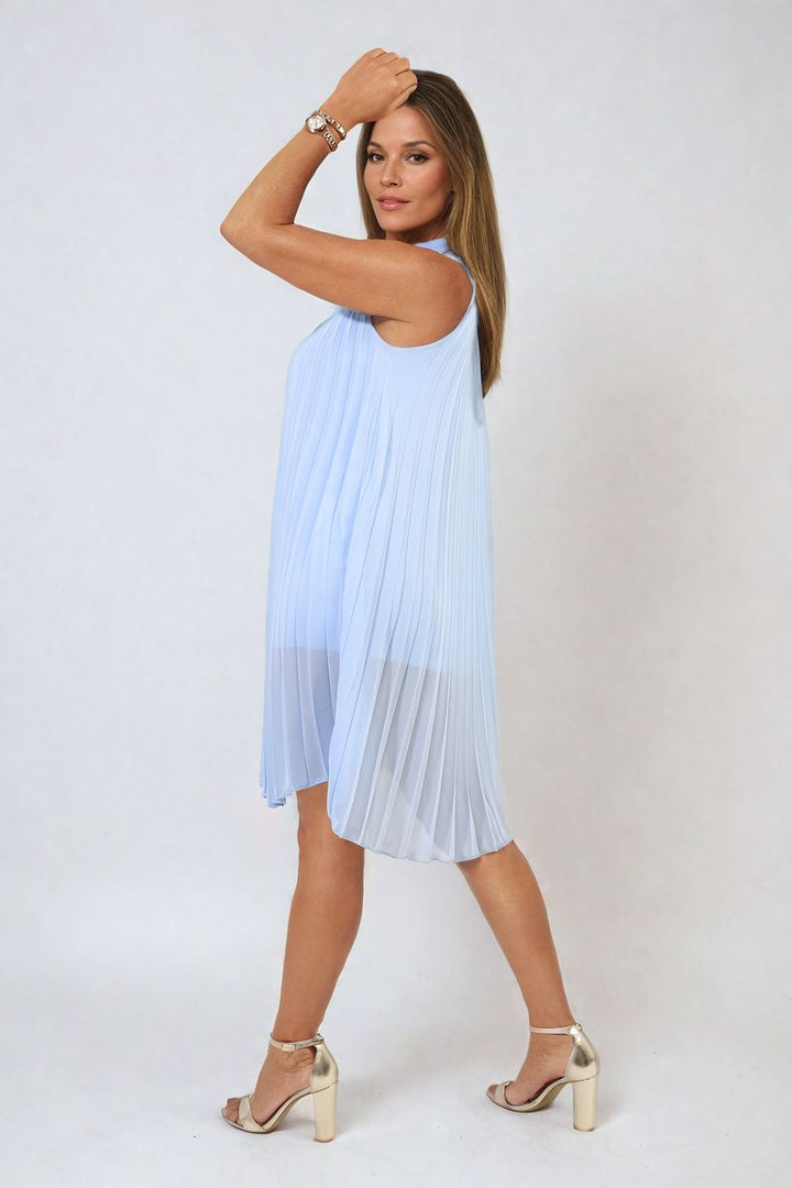 Woman modeling the Pleated Halter Neck Mini Dress, showcasing its elegant silhouette and flattering fit, perfect for stylish holiday occasions and everyday wear.