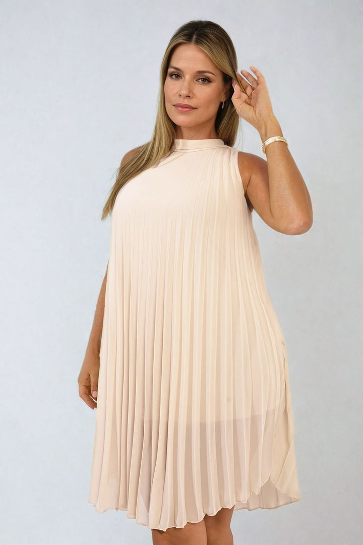 Woman wearing the Davina Pleated Halter Neck Mini Dress, showcasing a flattering silhouette with pleated design and halter neckline, perfect for stylish holiday occasions.