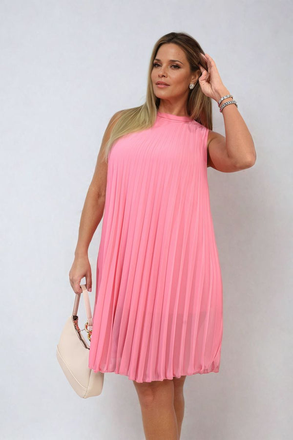 Woman wearing Pleated Halter Neck Mini Dress, showcasing elegant pleats and halter neckline, perfect for stylish holiday occasions or everyday elegance.