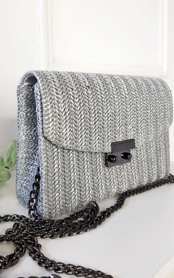 Woven Handbag featuring silver knit design and black chain strap, perfect as a chic addition to your accessory collection, enhancing any outfit effortlessly.