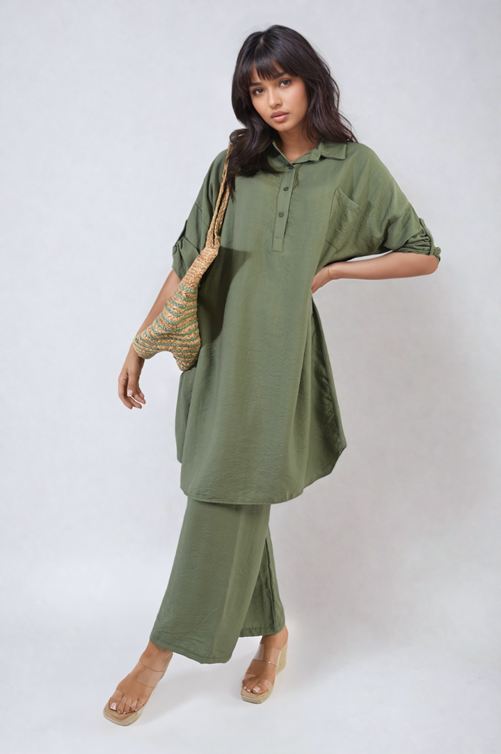 Woman wearing the Oversized Button Front Shirt & Wide Leg Pants Co-ord Set, showcasing its stylish and comfortable fit, perfect for relaxed, everyday wear.