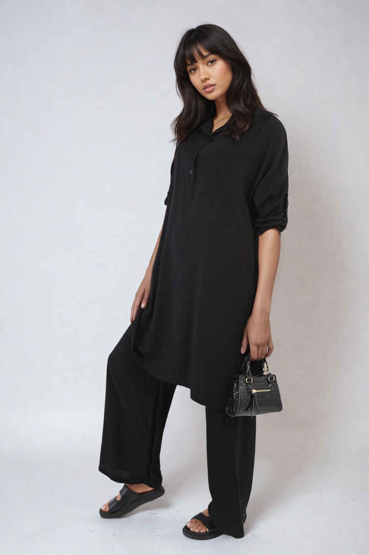 Woman wearing Dulce Oversized Button Front Shirt & Wide Leg Pants Co-ord Set, showcasing stylish and comfy casual wear from Holiday Clothes UK.