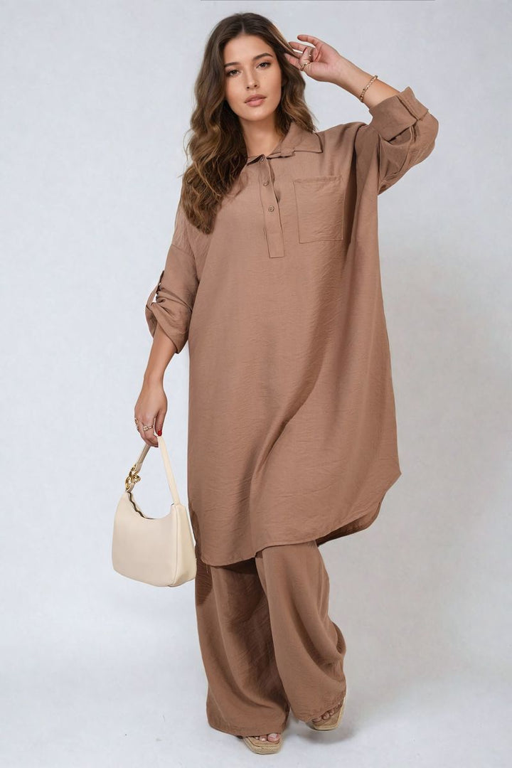 Woman wearing Dulce Oversized Button Front Shirt & Wide Leg Pants Co-ord Set, showcasing a comfortable and stylish outfit ideal for relaxed, everyday wear.