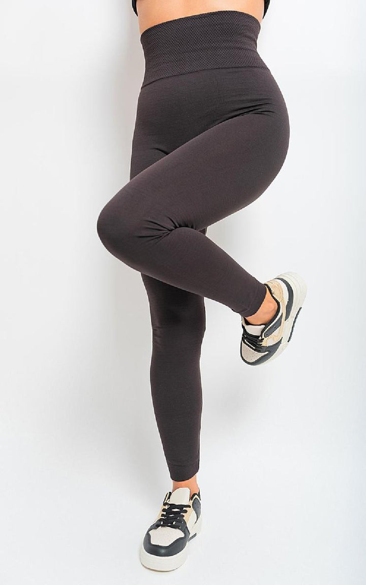 High Waist Tummy Compression Slimming Leggings - Big Size, showcasing a leg in leggings and sneakers, highlighting comfort and support features.