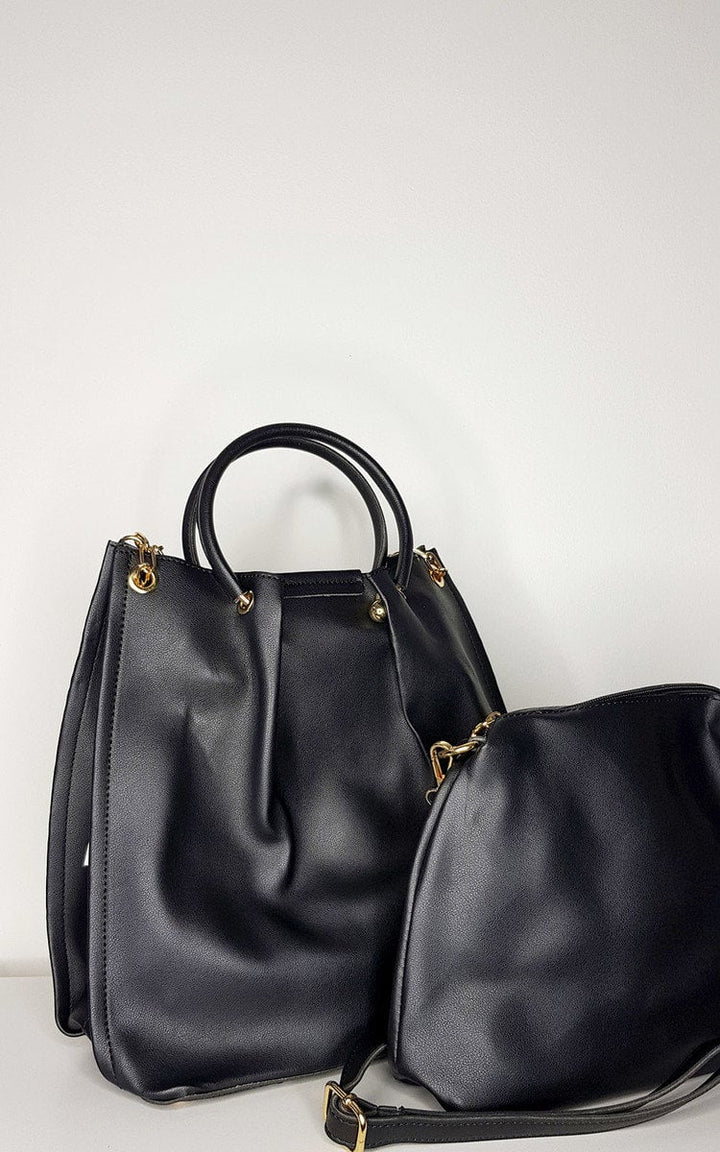 Handbag with gold handles and zip fastening, featuring faux leather, multiple compartments, and detachable shoulder strap. Includes a small matching shoulder bag.