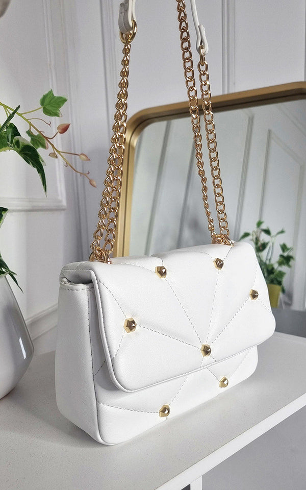 Studded with Chain Detail Handbag featuring faux leather with gold chain and stud accents, perfect for elevating your style from Holiday Clothes UK.