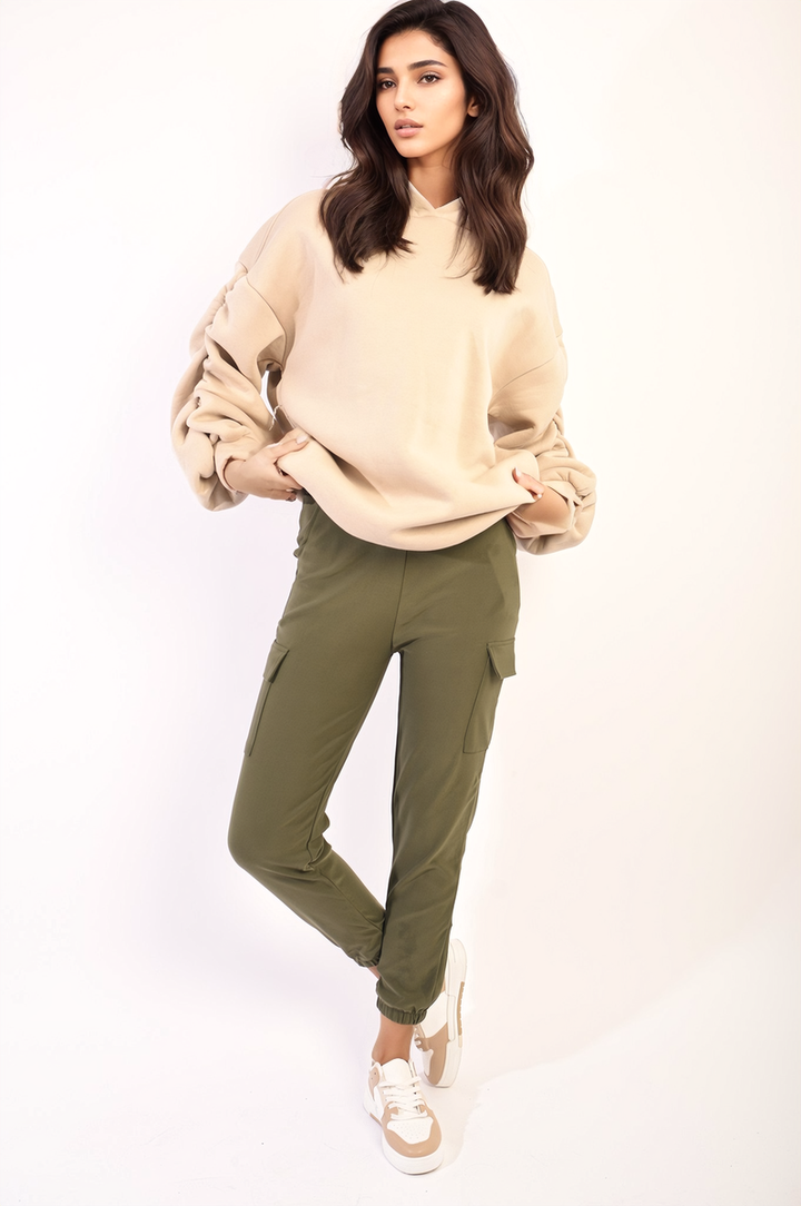 Woman wearing Cargo Pocket Trouser with Drawstring, showcasing its casual style and utility, perfect for versatile everyday wear from Holiday Clothes UK.