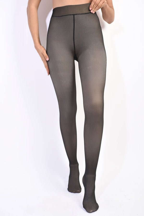 Winter Tights Fleece Lined Pantyhose Leggings showcasing a close-up of legs, highlighting their snug fit and soft, fleece-lined texture for winter warmth.