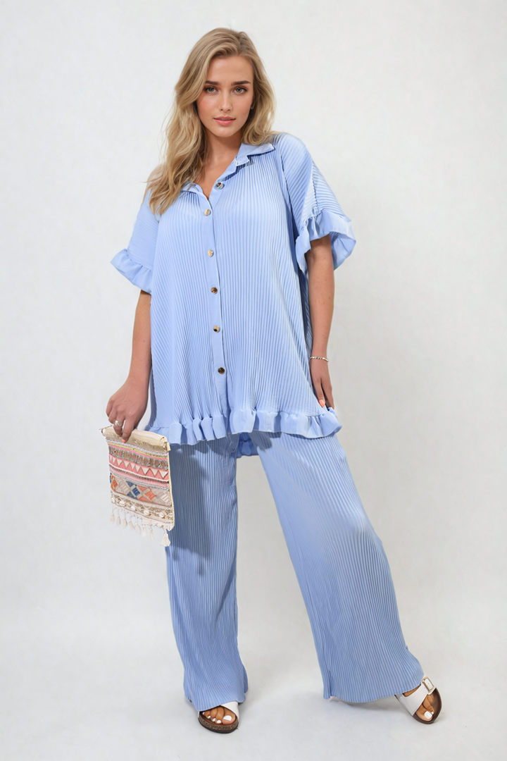 Emily Button Pleated Frill Ruffle Top and Wide Leg Trouser Co-ord Set, featuring elegant ruffles and pleats, worn by a woman for versatile styling.