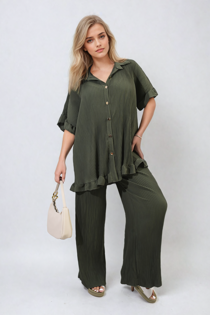 Woman wearing the Button Pleated Frill Ruffle Top and Wide Leg Trouser Co-ord Set, showcasing elegant design and stylish comfort.