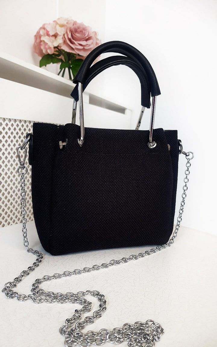 Mini Textured Chain Handbag featuring a sleek black design with silver chain and handheld strap, perfect for stylish, versatile accessorizing.