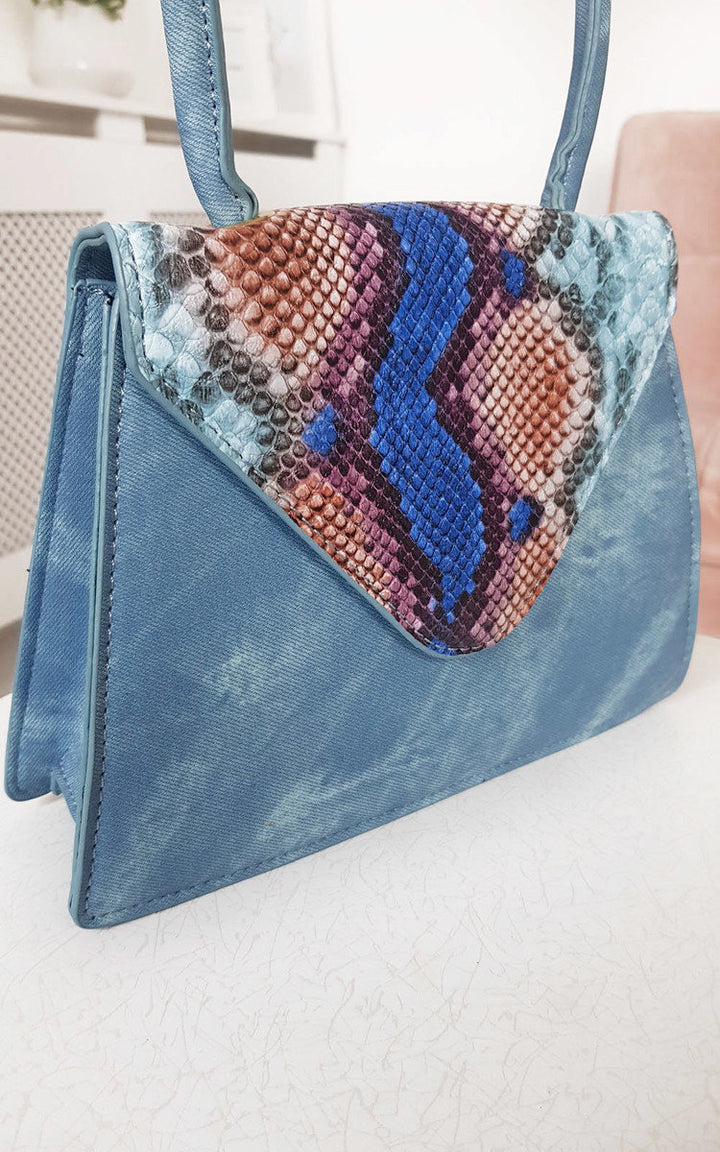 Croc Print Shoulder Handbag with denim material, featuring a colorful pattern design and button fastening, ideal for stylish holiday and everyday use.