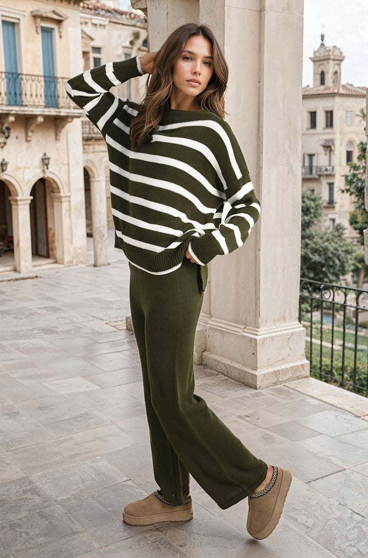 Woman wearing a Knitted Striped Long Sleeve Top and Pants Co-ord Set, posing outdoors, showcasing its casual, chic style suitable for relaxing or outings.