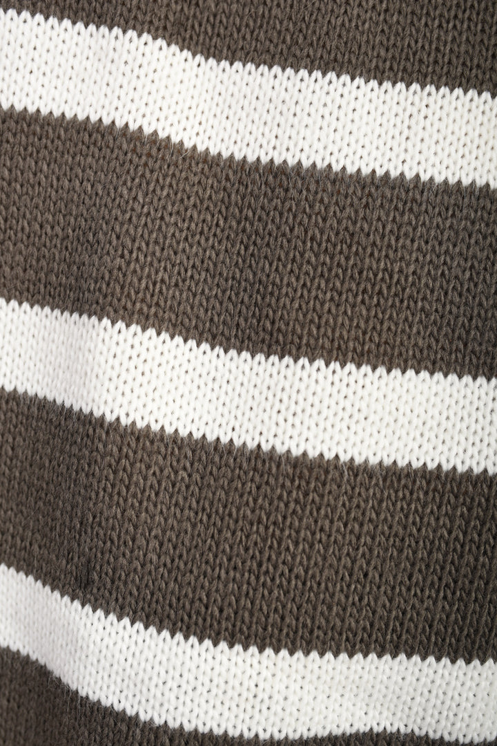 Close-up of a knitted fabric from the Knitted Striped Long Sleeve Top and Pants Co-ord Set, showcasing its cozy, chic design and striped pattern.