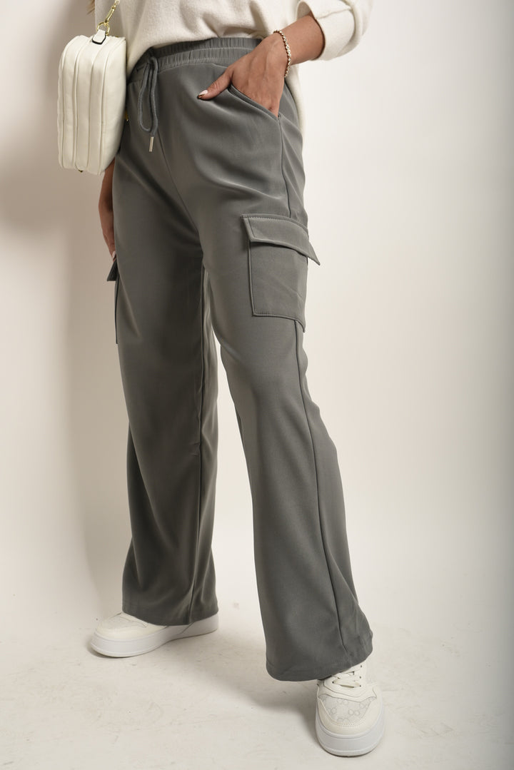 Wide Leg Drawstring Waist Flap Pocket Trouser with stylish wide leg and drawstring waist, shown worn with a focus on design and functional pockets.