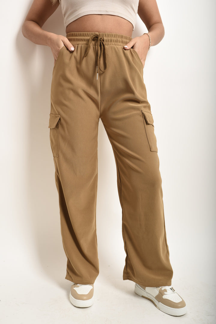 Wide Leg Drawstring Waist Flap Pocket Trouser showcased on a model, highlighting the wide leg design and functional flap pockets for stylish versatility.